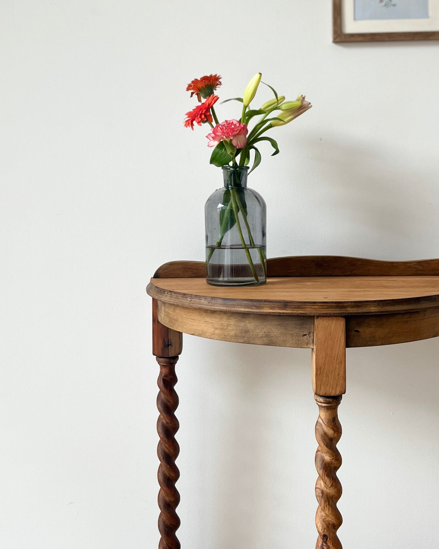 Halfmoon console with barley twisted legs