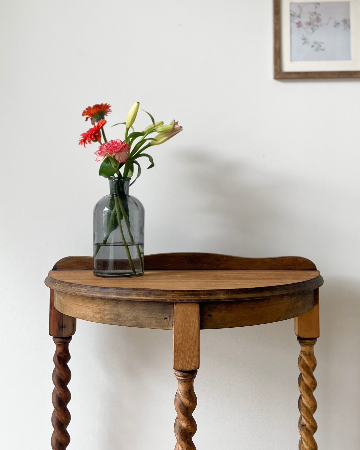 Halfmoon console with barley twisted legs