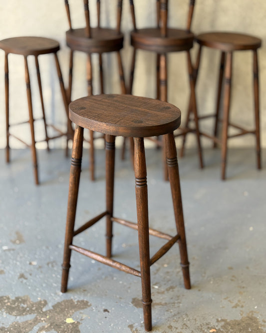 Three Alo Oval bar stools styled at a white kitchen island, handmade timber with turned legs, Sydney