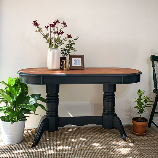 Noir pedestal table