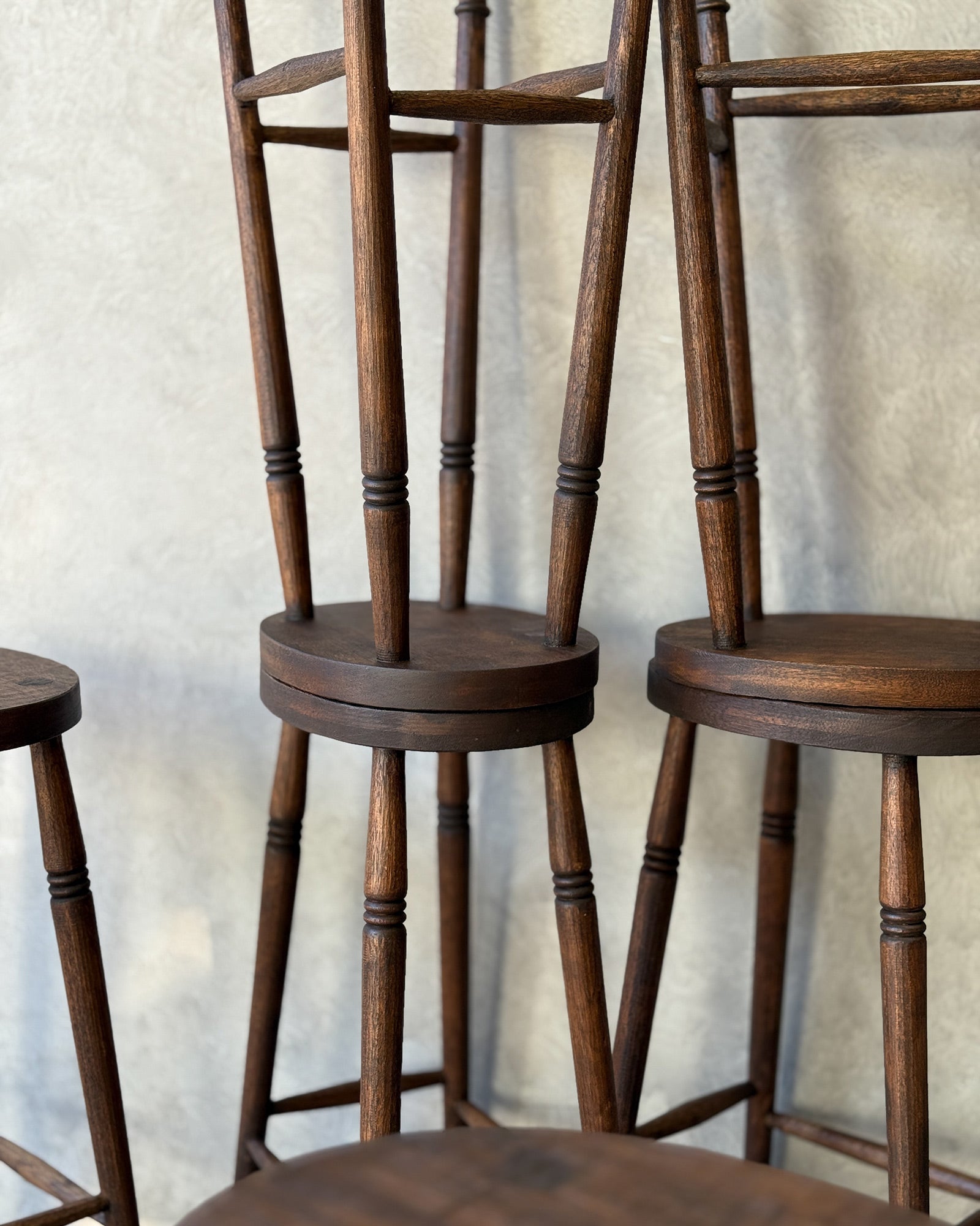 Alo Oval kitchen bar stools styled at a white kitchen island bench