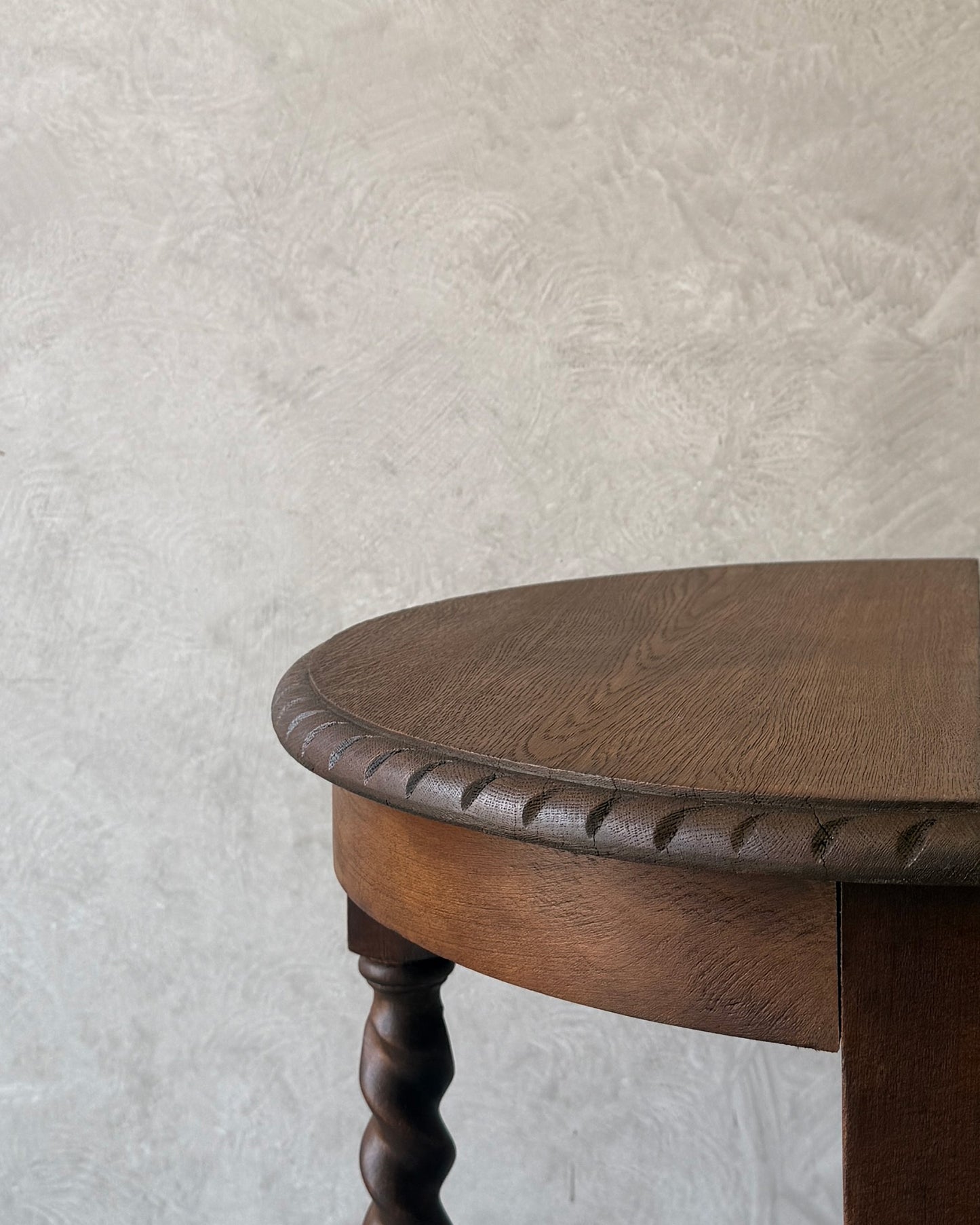 Demi-lune console table with barley twist legs in dark wood, restored in Sydney workshop