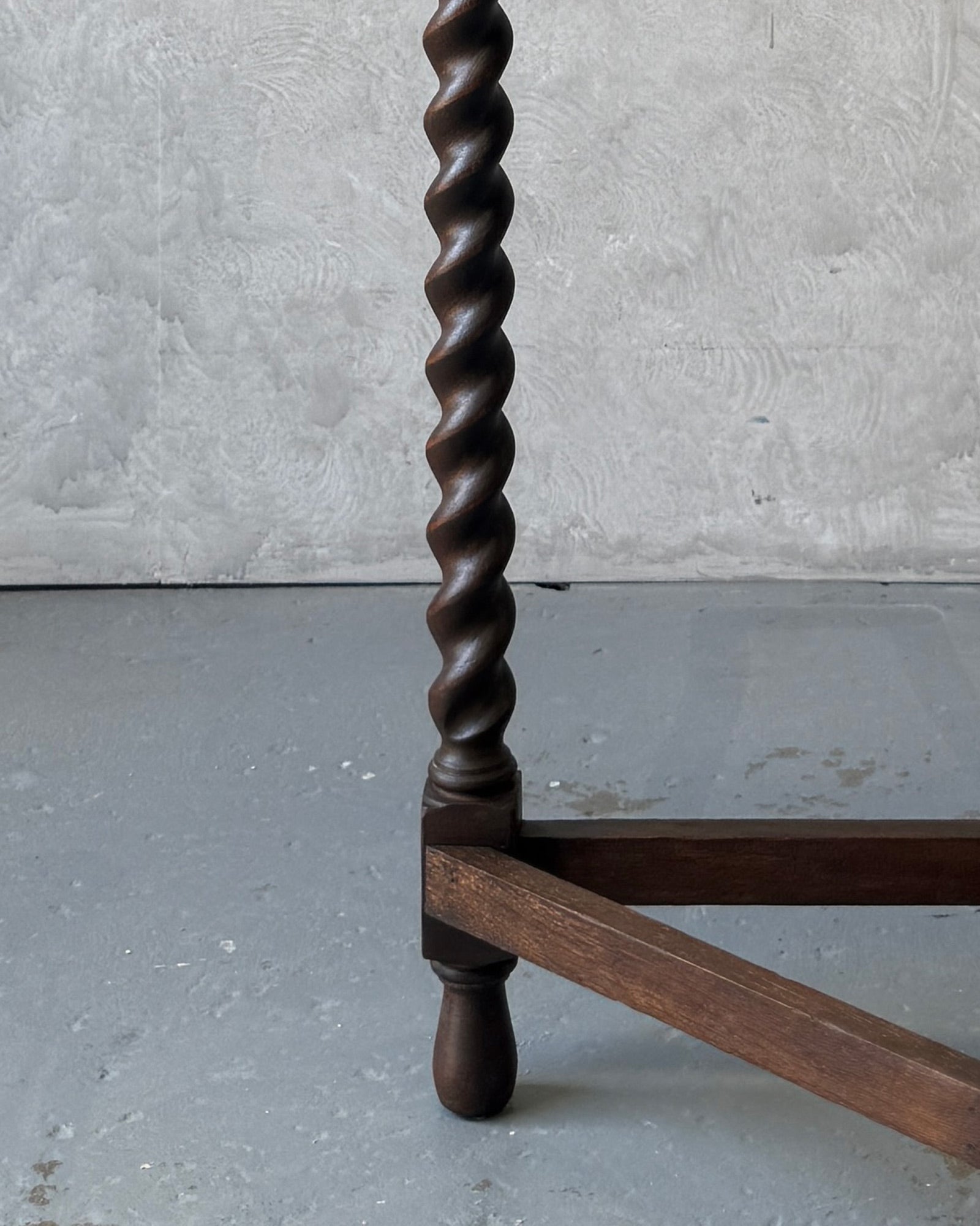 Demi-lune console table with barley twist legs in dark wood, restored in Sydney workshop