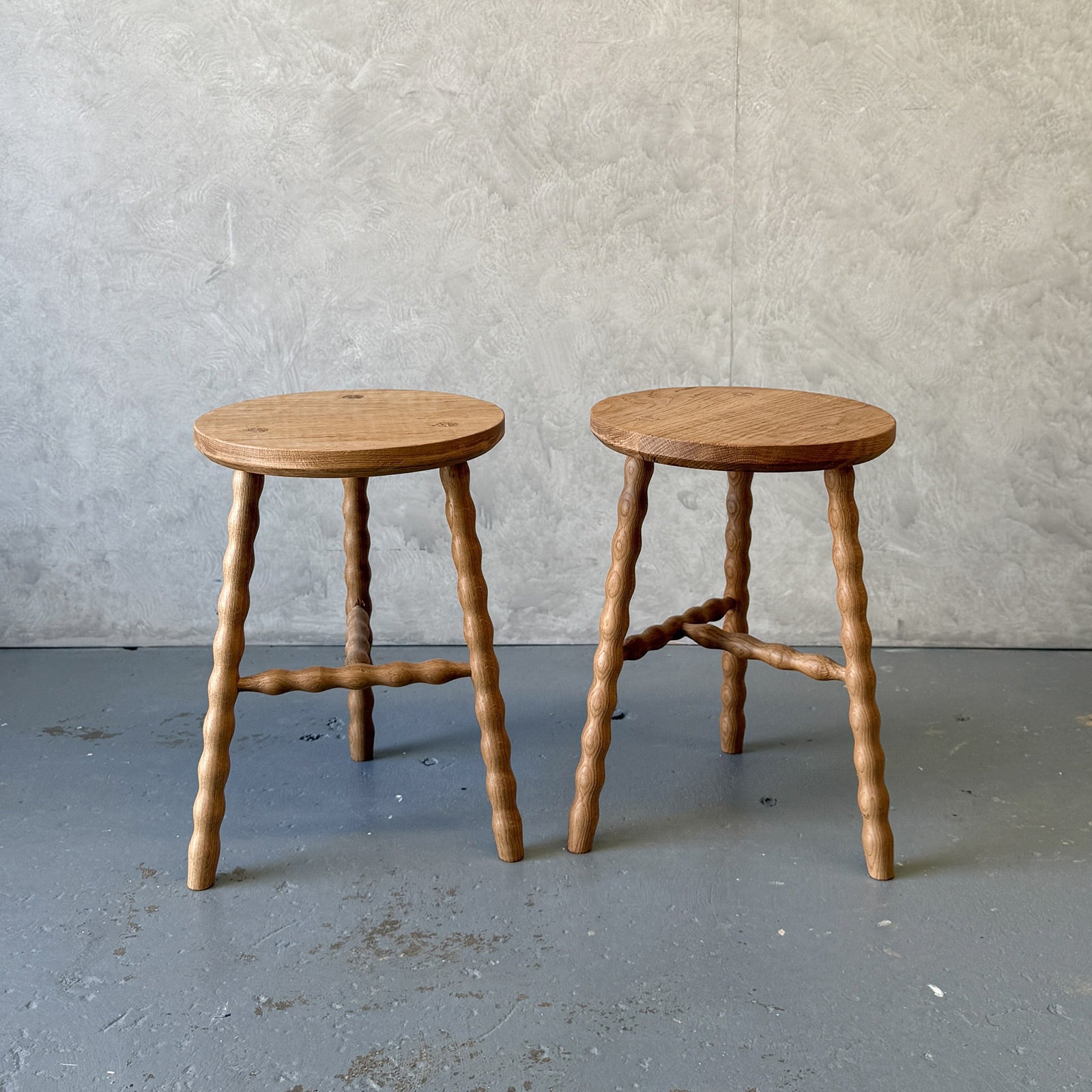 Round Bobbin Stool in American Oak with hand-turned legs, with stretcher base
