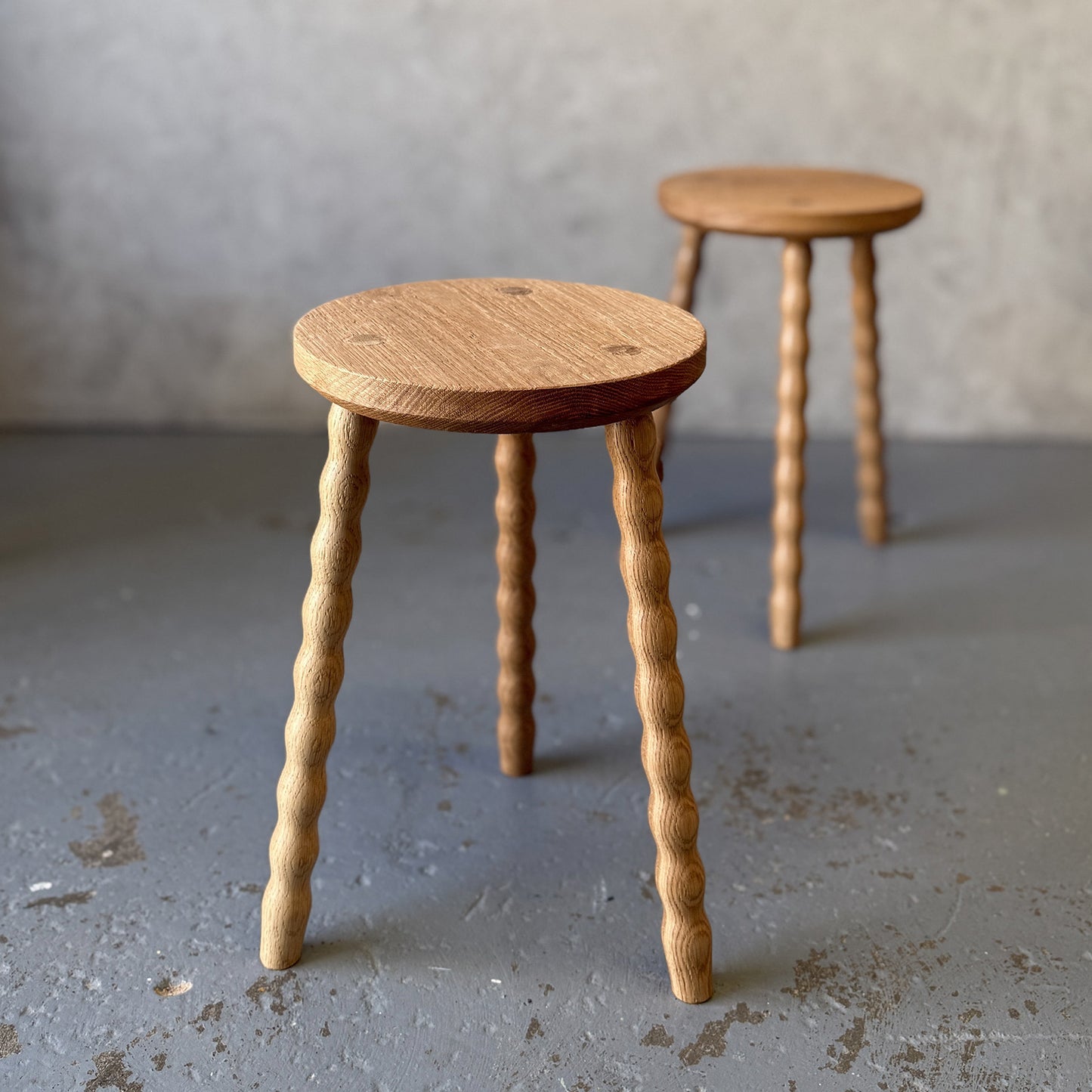Round Bobbin Stool in American Oak with hand-turned legs, no stretcher base